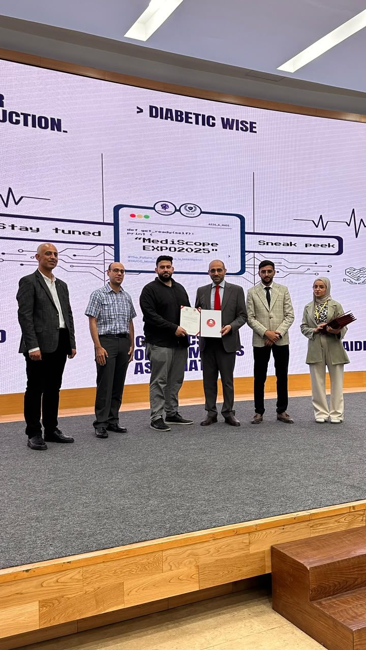 MCC founders receiving recognition on stage at MediScope Expo 2025