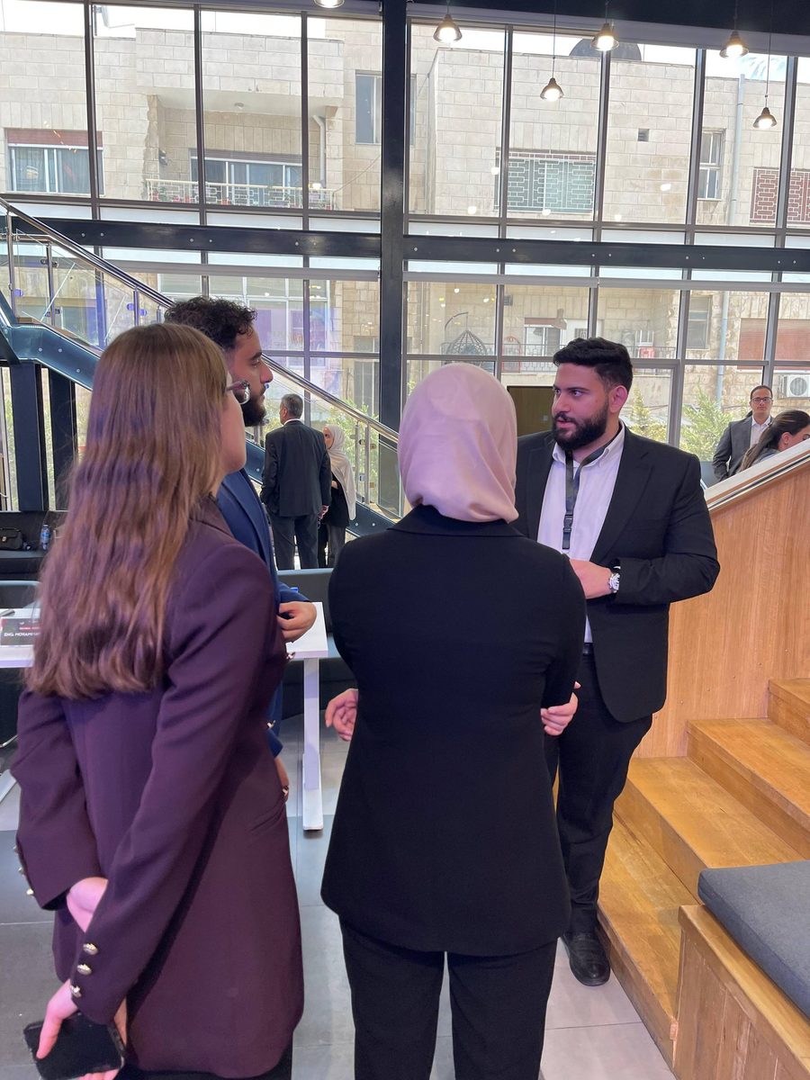 MCC team members networking at an industry event